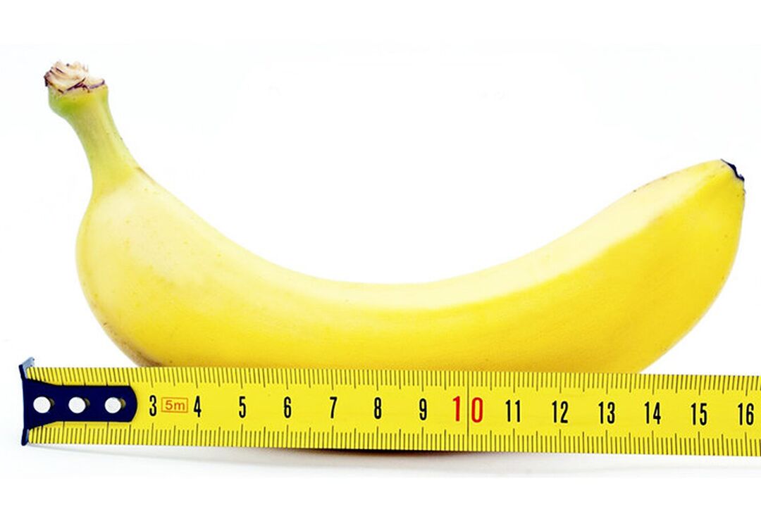 o banană cu o riglă simbolizează măsurarea penisului după operație